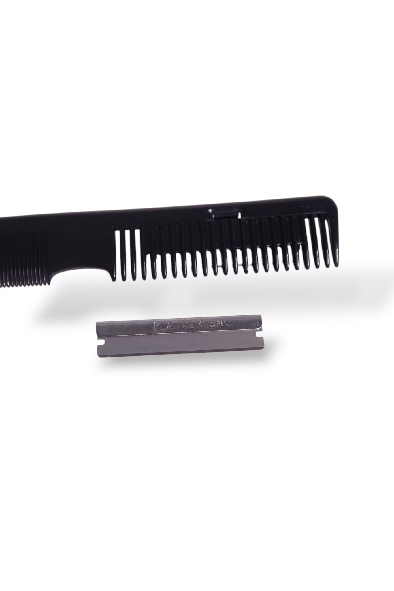 Two way razor comb